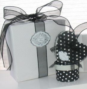 gift wrap accessories, embossed seals, product tags, enclosure cards, K.C. Decorative Seal