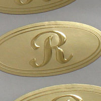 hot stamp, embossed seal, initial R, personal seal