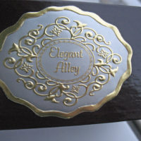 silver ink, gold foil, embossed, custom seal